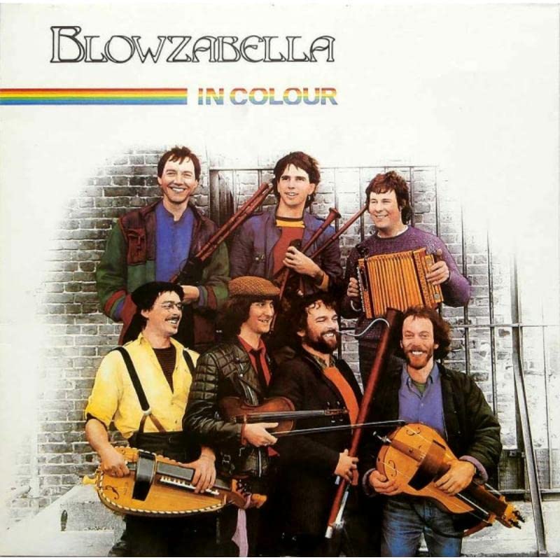Album cover for Blowzabella's "In Colour" featuring a folk band portrait.