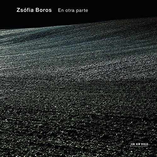 A CD cover with a dark, textured surface and white text: "Zsófia Boros - En otra parte".