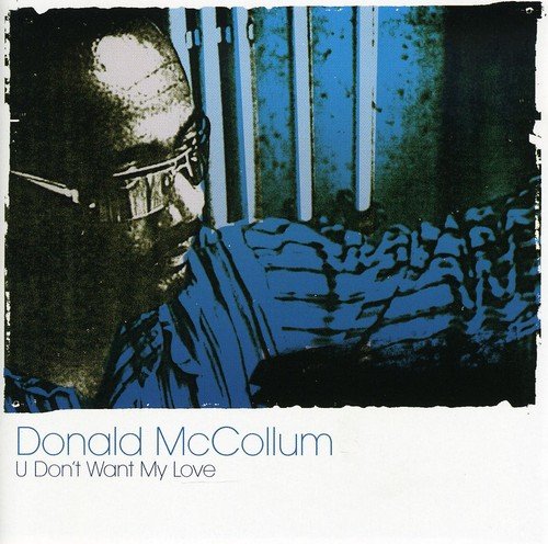 "CD cover with a man wearing glasses, blue-toned image, artist and title text."