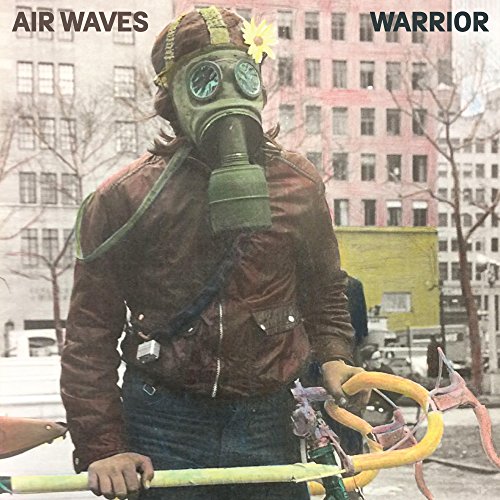 Album cover: person in gas mask with flower, urban background.