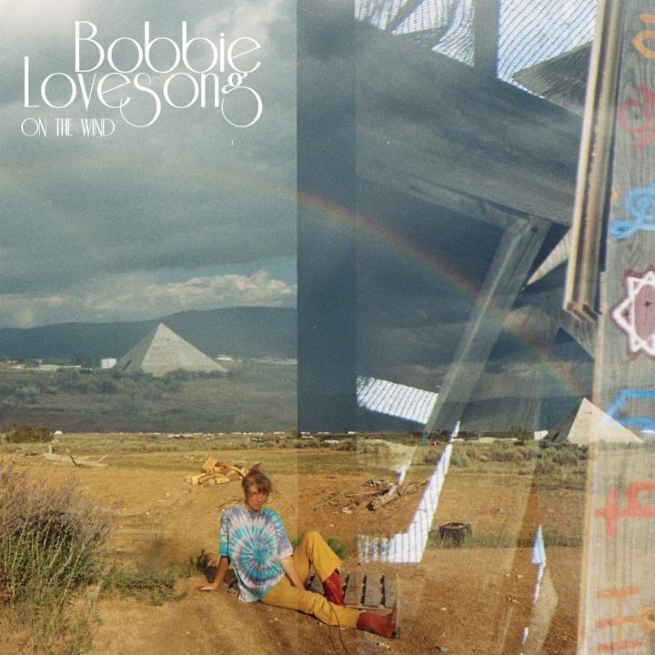 Vinyl record cover: Bobbie Lovesong, “On The Wind”, landscape and person.
