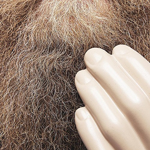 "Album cover with a hand over a hairy chest, 'Neil Cowley Trio Touch and Flee' text."