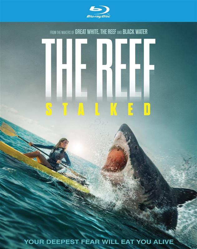Blu-ray cover for "The Reef Stalked" featuring a shark and kayaker.
