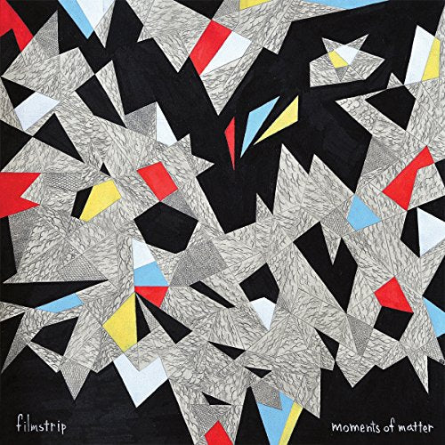 Abstract black and white patterned vinyl record cover with red, yellow, and blue accents.