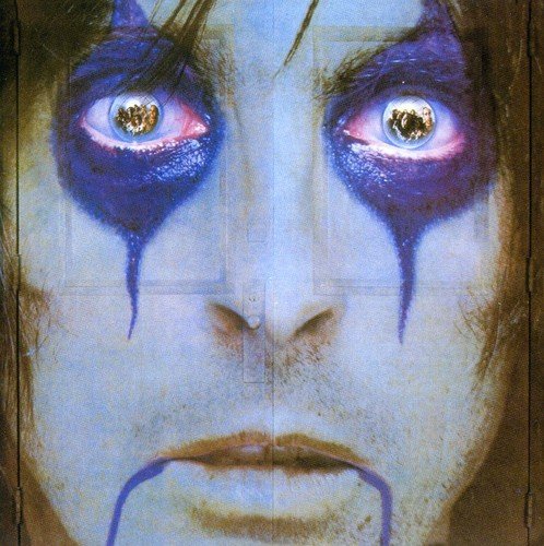 "Album cover with a close-up of a person's face, purple eye makeup."