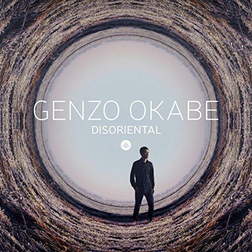 Man stands in a tunnel, looking up, on a music album cover.