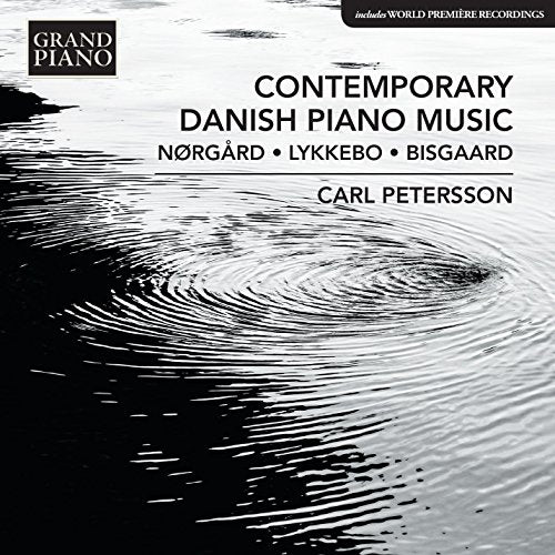 "CD cover with black and white rippled water design and text describing the album."