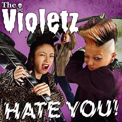 Three musicians with guitars pose against a purple background with The Violetz Hate You text.
