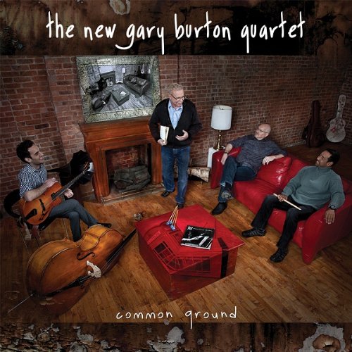 The album cover shows four men in a room with musical instruments.