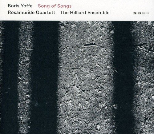 "CD cover with black and white image of tire tracks on a dirt surface."