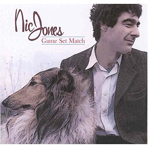 "Album cover featuring a man in a suit with a large dog."