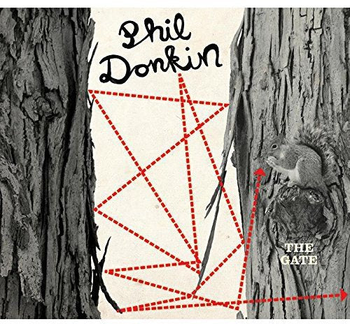 "Album cover with a squirrel on a tree and a red pentagram."