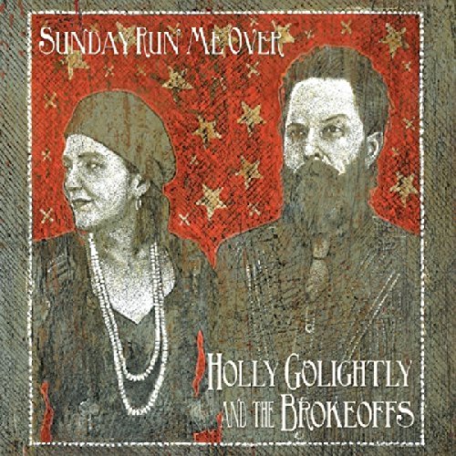 Album cover featuring a man and woman against a red patterned background.