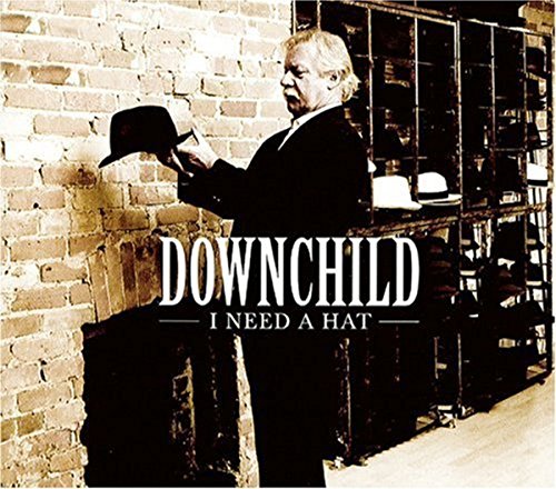 Man in suit holding a hat, album cover for Downchild's "I Need A Hat".