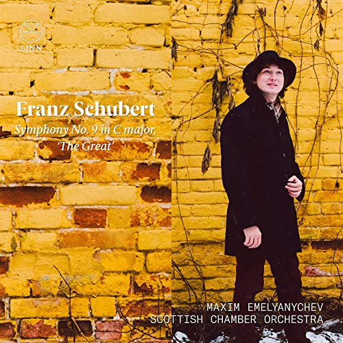 CD cover: portrait of Maxim Emelyanychev before a brick wall.