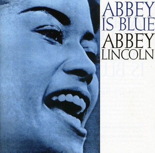 "Album cover featuring a black-and-white close-up of Abbey Lincoln's face with text."