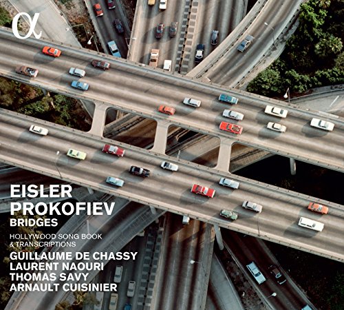 "CD cover featuring an aerial view of a multi-level highway interchange with traffic."