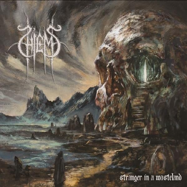 Dark fantasy album cover with skull-shaped rock formation and distant mountains.