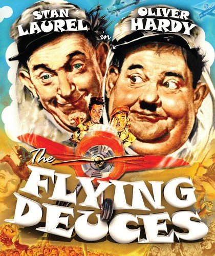 Laurel and Hardy in pilot uniforms with a small red airplane.