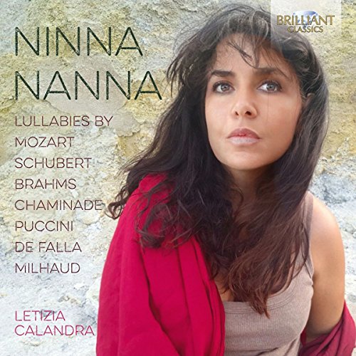 CD cover featuring a young woman with long dark hair and a red shawl.