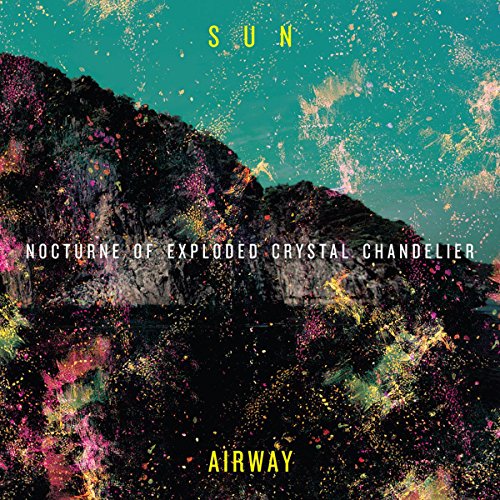 Album cover with abstract mountain range and sparkling, colorful debris.