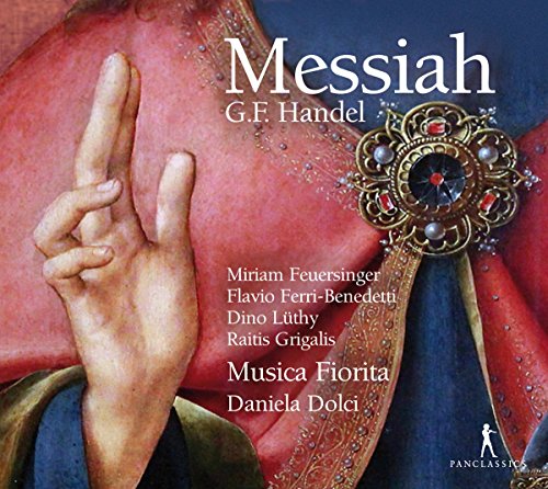 "Album cover for Handel's 'Messiah' featuring a hand gesture and ornate brooch."