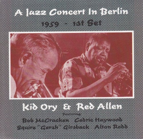 "CD cover with red-toned photo of two musicians playing trumpets on gray background."
