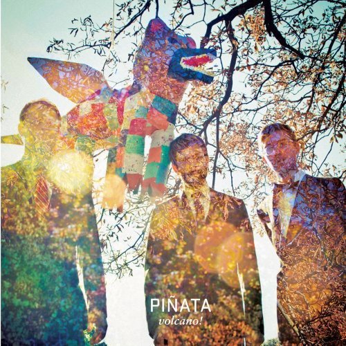 The image shows a colorful album cover with three men and a piñata. For accessibility purposes, a suitable alt text could be: "Album cover with three men and a piñata, multi-colored, outdoors."