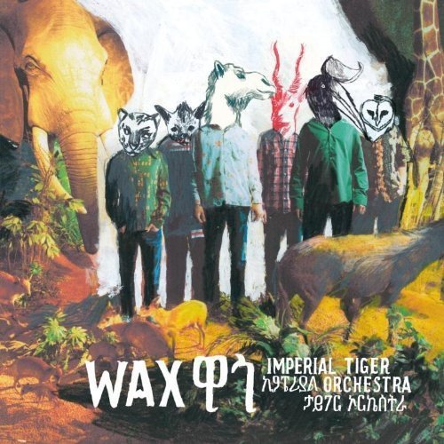 The image depicts a vinyl album cover. For accessibility purposes, a suitable alt text could be: "Vinyl album cover with men wearing animal masks."