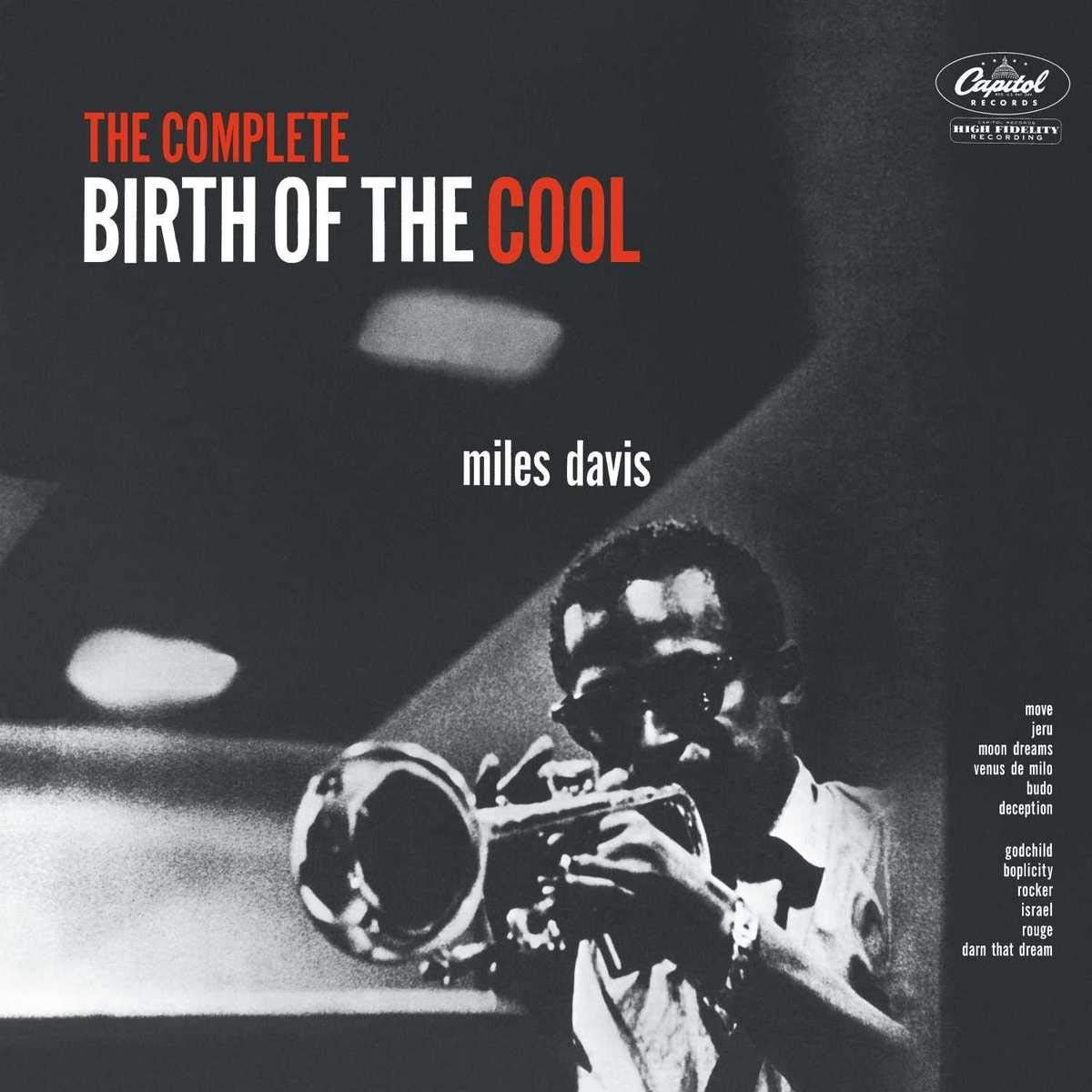 "Album cover featuring Miles Davis playing trumpet, black and white image with text."