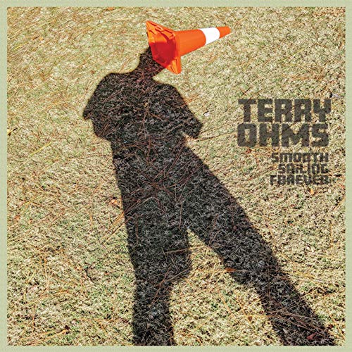"Album cover with shadowy figure wearing traffic cone on head, artist name, and album title."