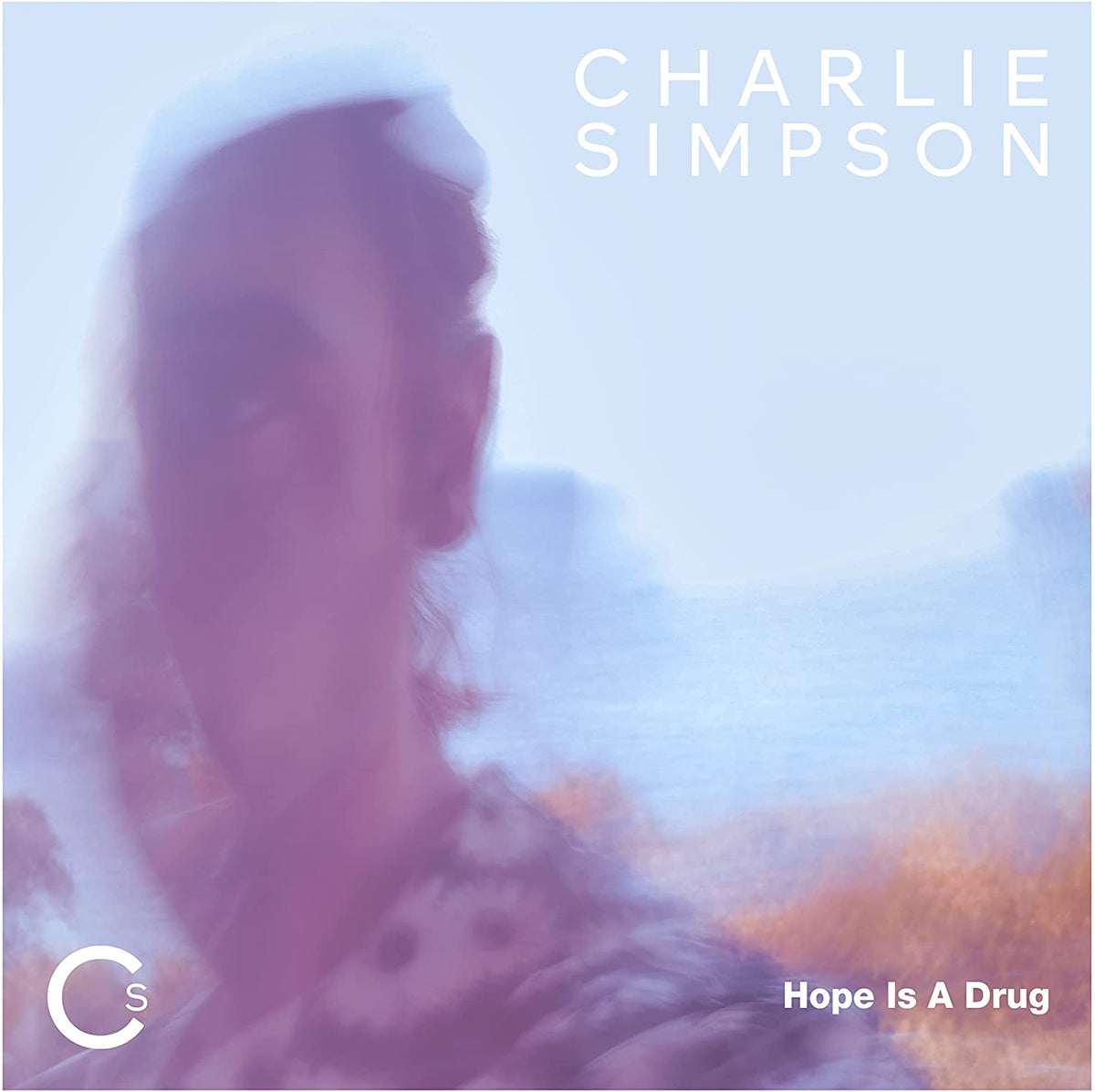 Album cover for Charlie Simpsonās āHope Is A Drugā with blurred portrait.