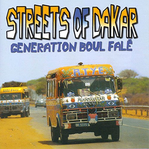 "Album cover with two decorated buses driving on a road, outdoors."