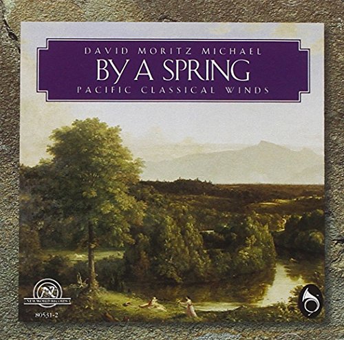 "CD cover with serene landscape painting and purple title banner on a grey surface."