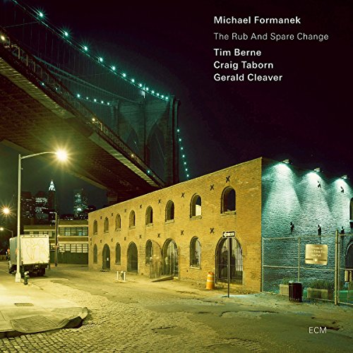 "Album cover with nighttime cityscape, lit building, and bridge, featuring white text with artist and title."