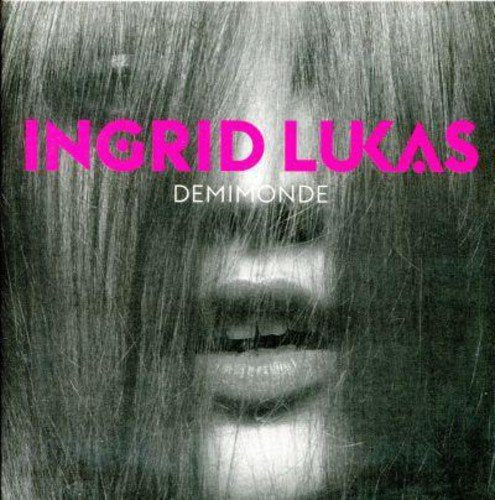 Album cover featuring a close-up of a woman's mouth with long hair, text "Ingrid Lukas Demimonde".