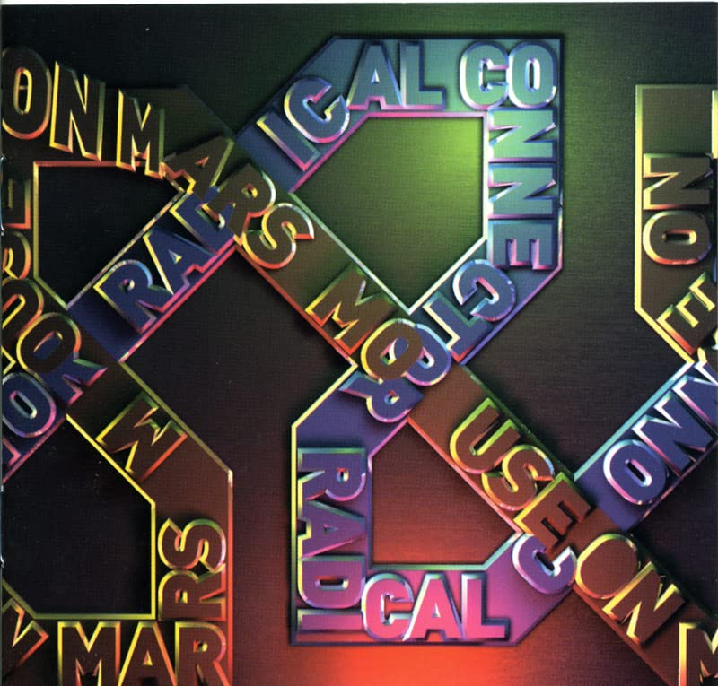 Close-up of a pink vinyl record cover with abstract, colorful text.