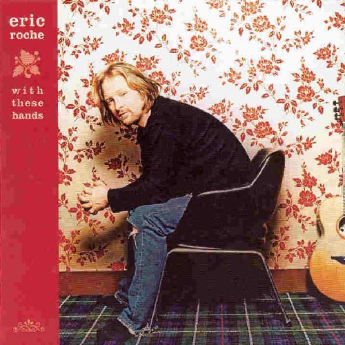 "Album cover with a man sitting on a chair, leaning against a floral wallpaper."