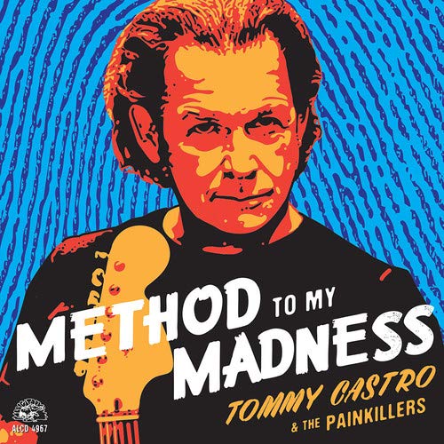 Album cover with man holding guitar, blue background, and white and yellow text.
