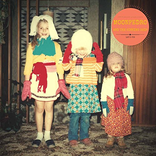 "Vinyl record cover featuring three children in colorful, retro outfits standing on a patterned carpet."