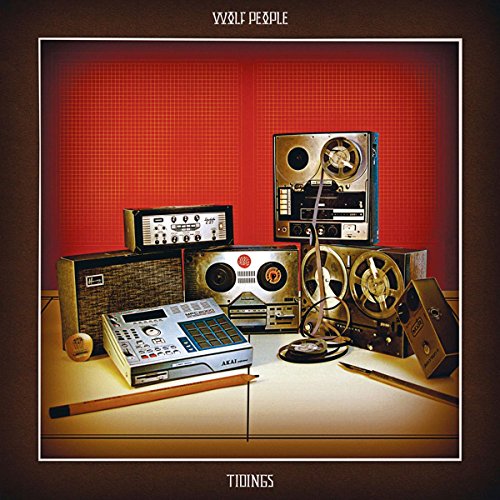 Tidings" CD cover featuring stacked vintage audio equipment on a red background.