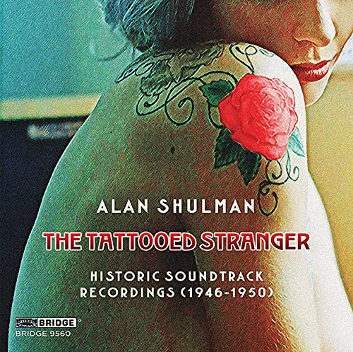 CD cover: woman’s back with a large red rose tattoo and title text.