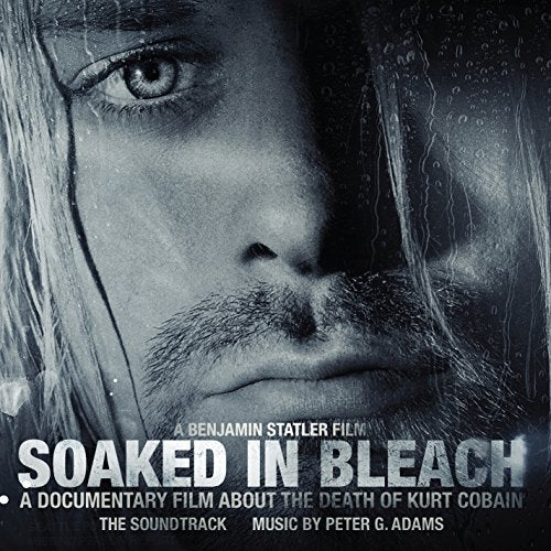 "CD cover with a close-up of Kurt Cobain's face, wet and dripping."
