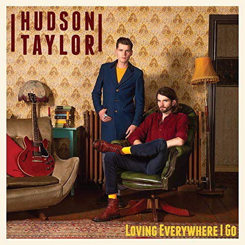 Album cover with two men in a room, one seated, one standing.