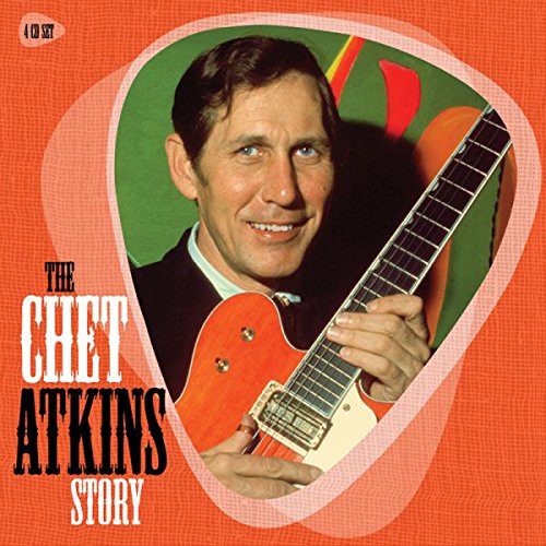 Chet Atkins holding a red guitar on an orange album cover.