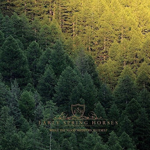 CD cover with a dense green forest and ornate crest logo.