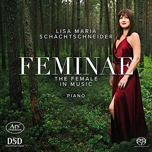 CD cover: pianist in red dress standing in a forest.