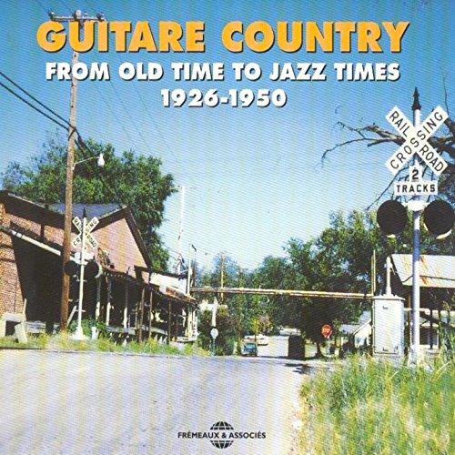 CD cover: rural street scene with railroad crossing, 1926-1950.