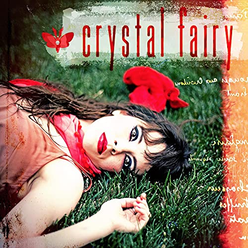 CD cover: woman lying in grass with red butterfly and ribbon.