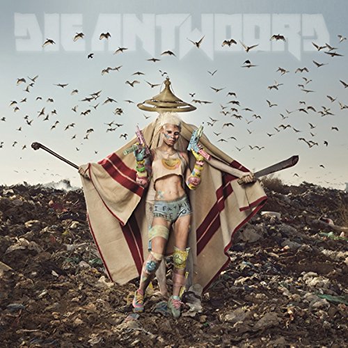 "CD album cover featuring a woman in a trash landscape with birds in the background."